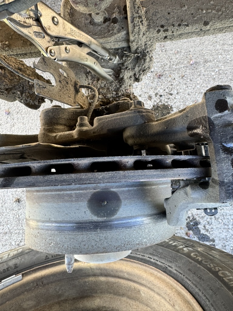 Close-up of brake and suspension repair