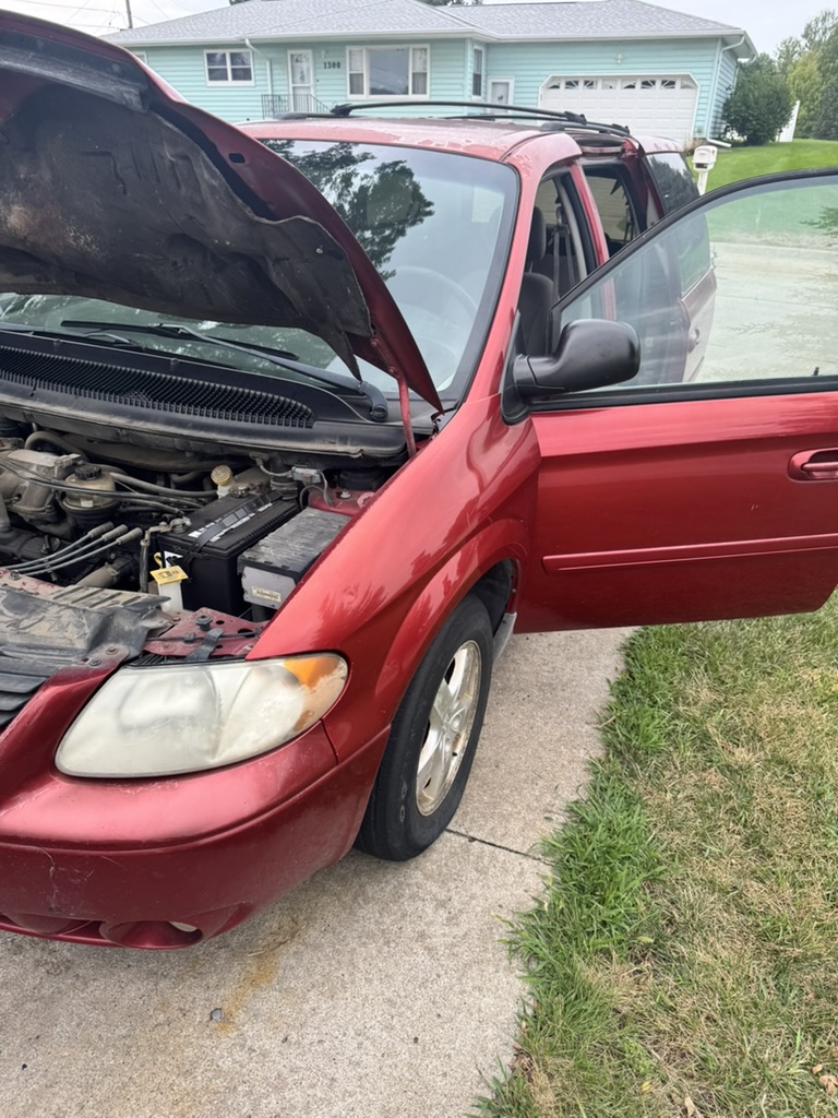 Mobile minivan service in a customer's driveway