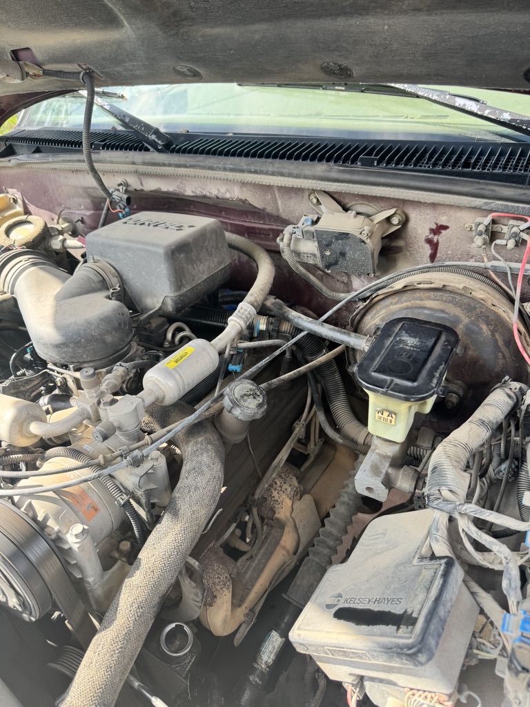Truck engine bay repair in progress